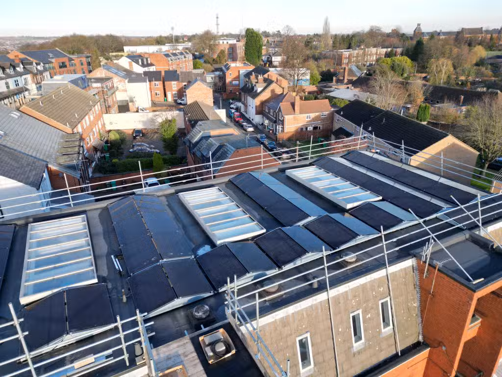 35kW JA Solar All Black Panels Flat Roof Array With Rooflights Aerial Overview Johns of Nottingham