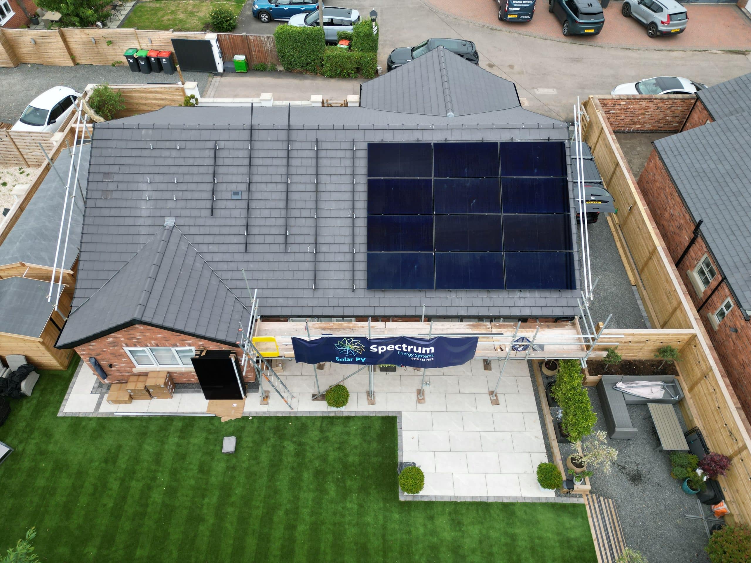 Aerial view of partial solar panel installation progress on Papplewick bungalow roof