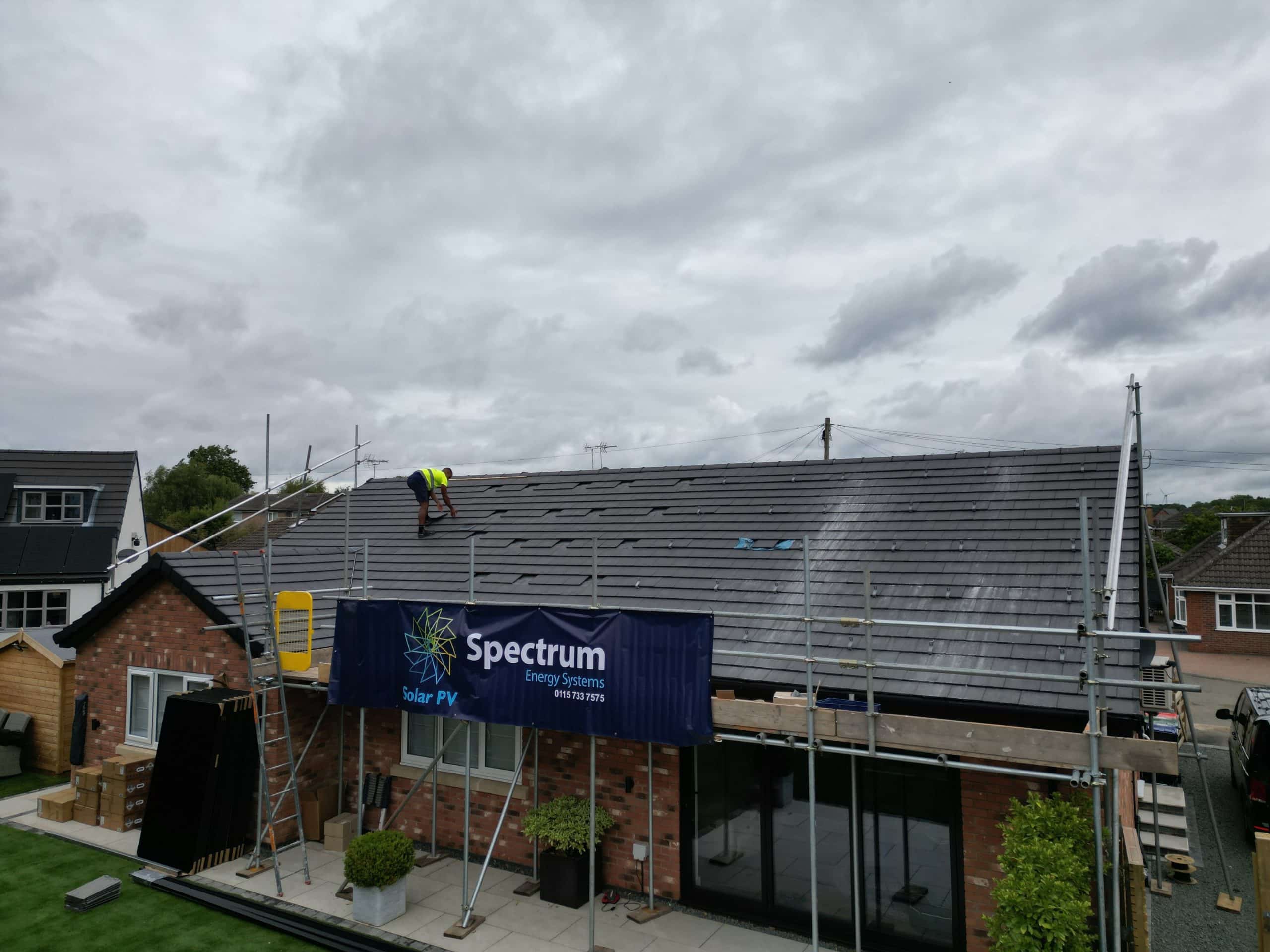 Solar panel mounting hooks and rails being installed on pitched roof during Papplewick installation