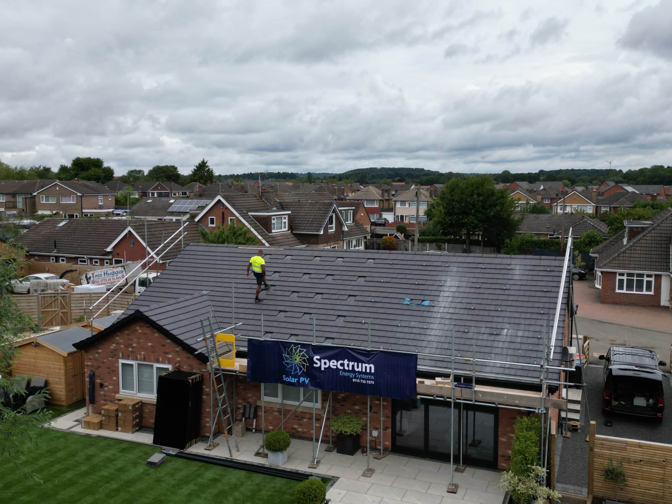 Scaffolding setup for residential solar panel installation on Papplewick bungalow roof