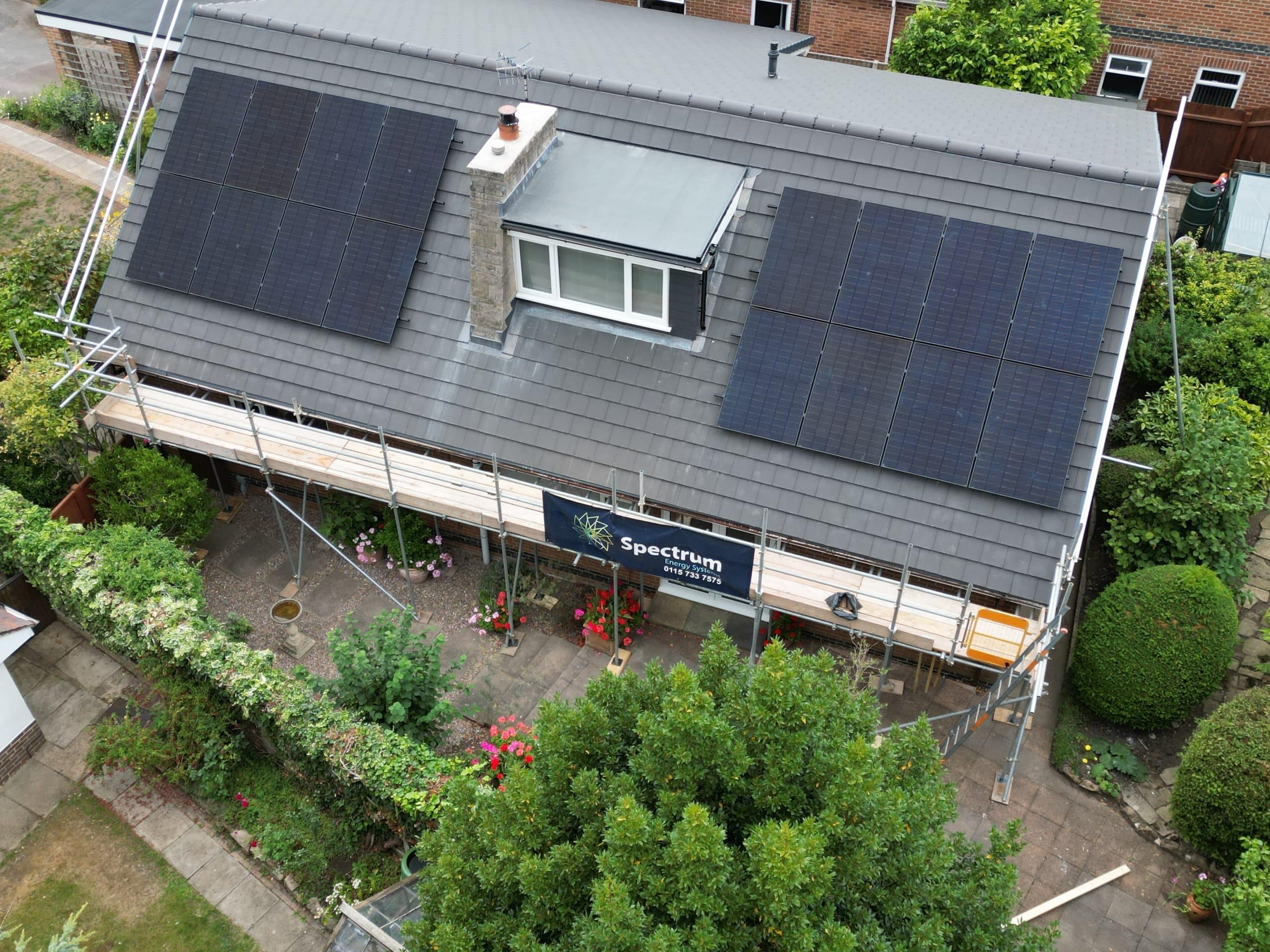 16 x 455W JA Solar all-black panels in split roof configuration during installation