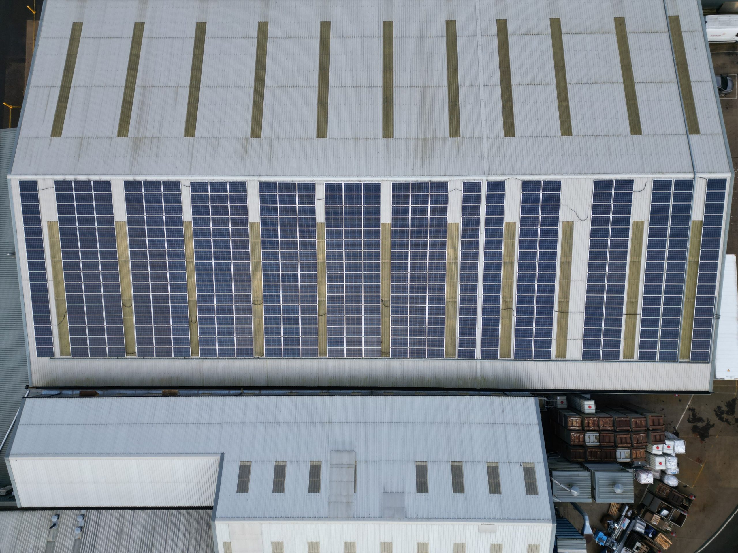Roof-mounted 177kW solar PV array aerial view showing panel layout on Elsoms Seeds warehouse