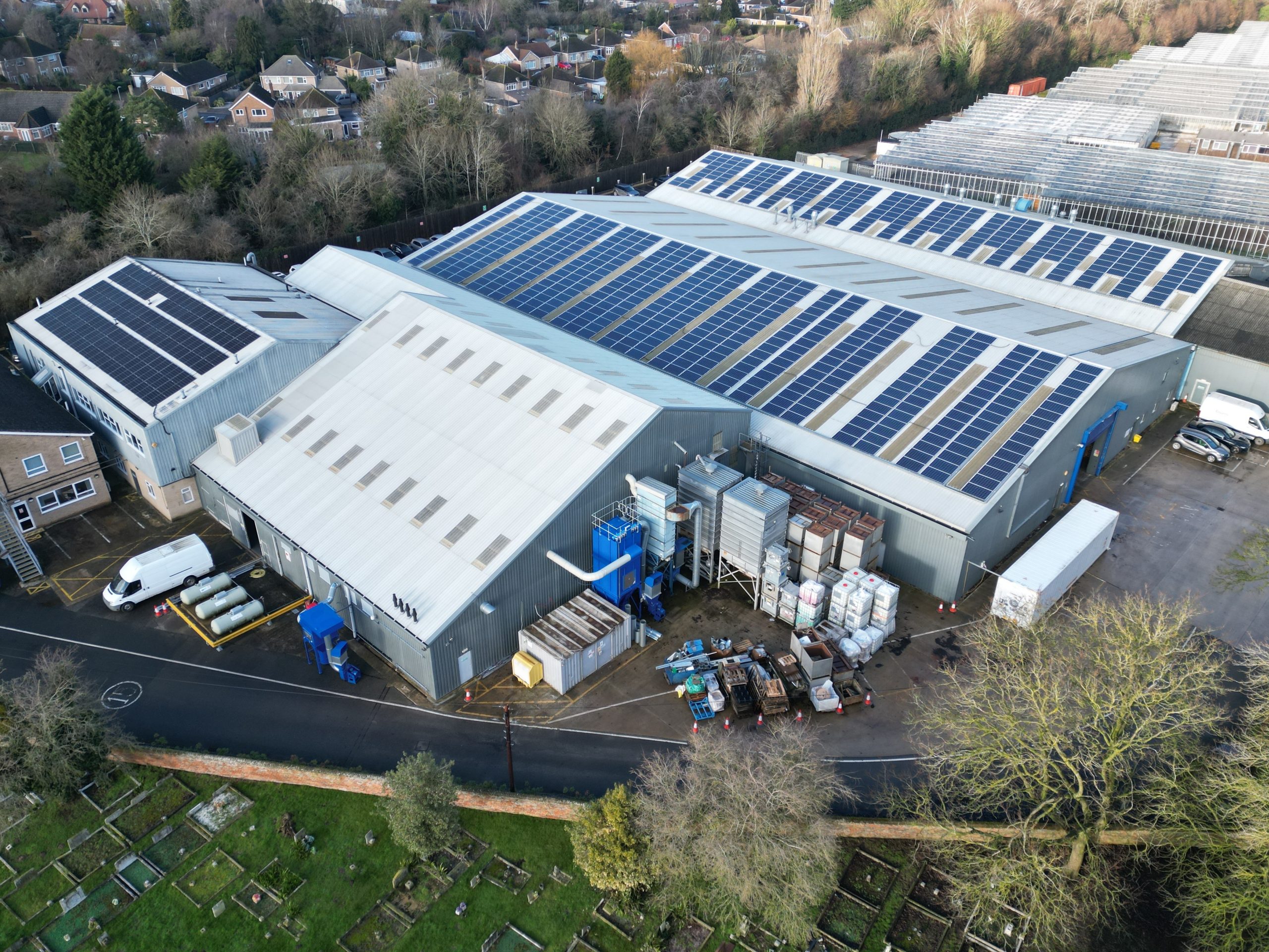 Completed 177kW roof-mounted commercial solar panel array covering warehouse rooftop at Elsoms Seeds