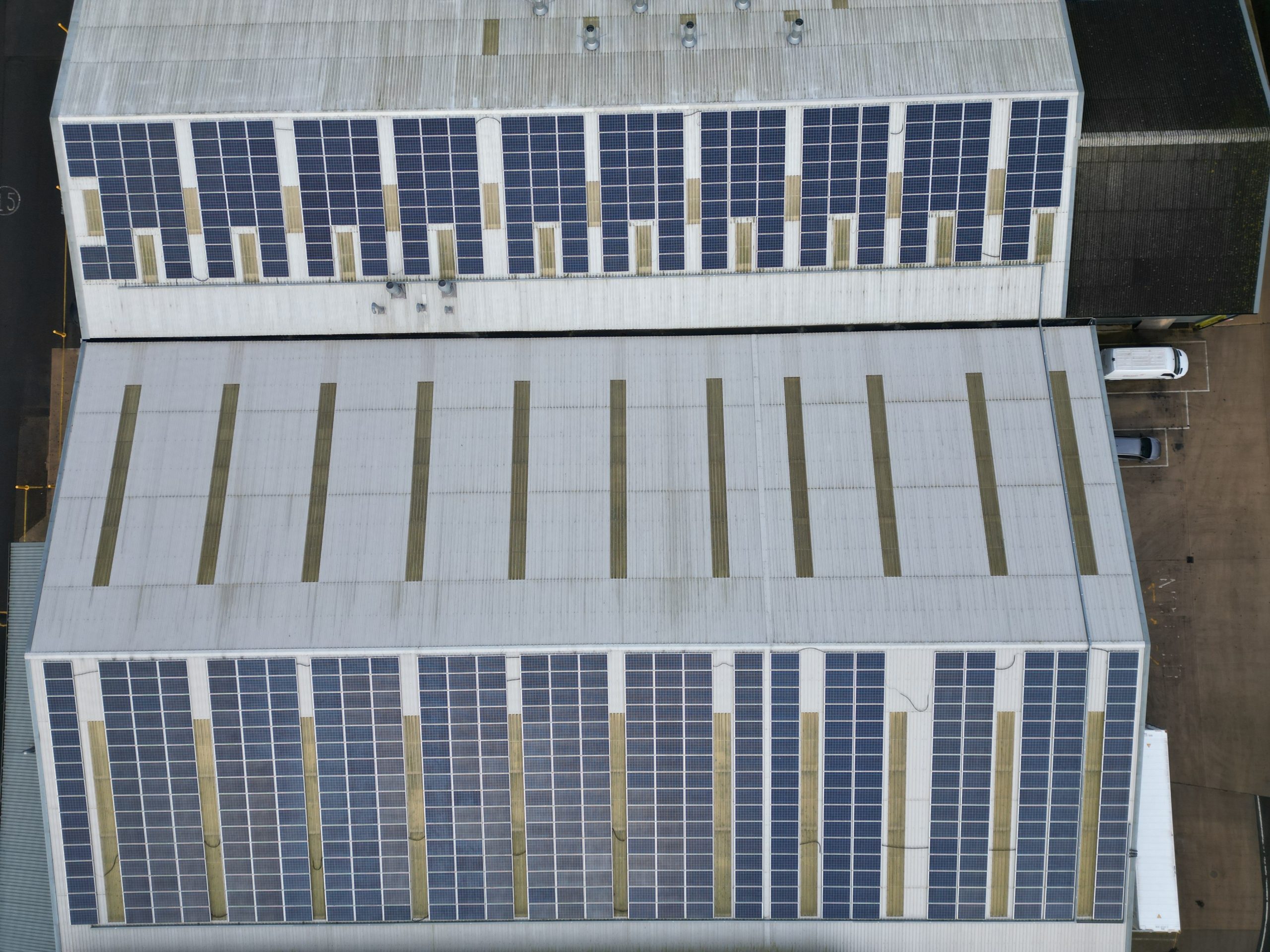 Aerial overview of completed 177kW solar installation covering warehouse rooftops at Elsoms Seeds