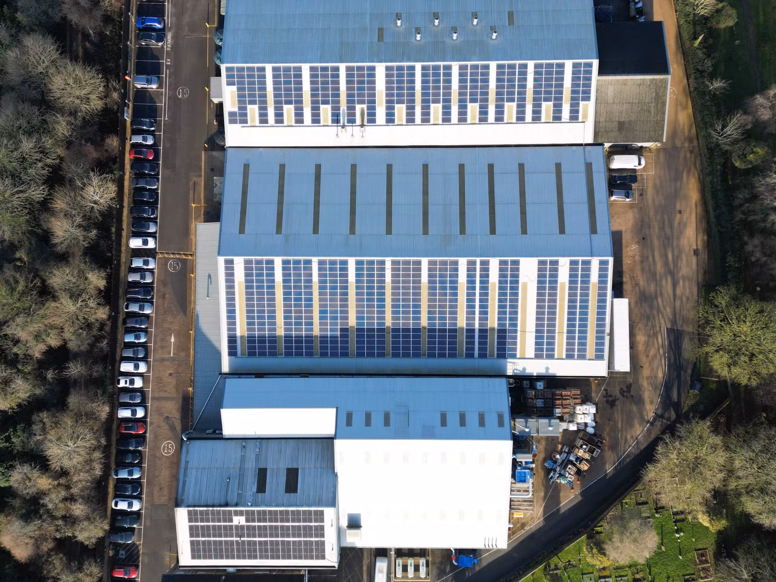 Aerial view of 177kWp commercial solar panel installation on metal warehouse roof at Elsoms Seeds, Spalding