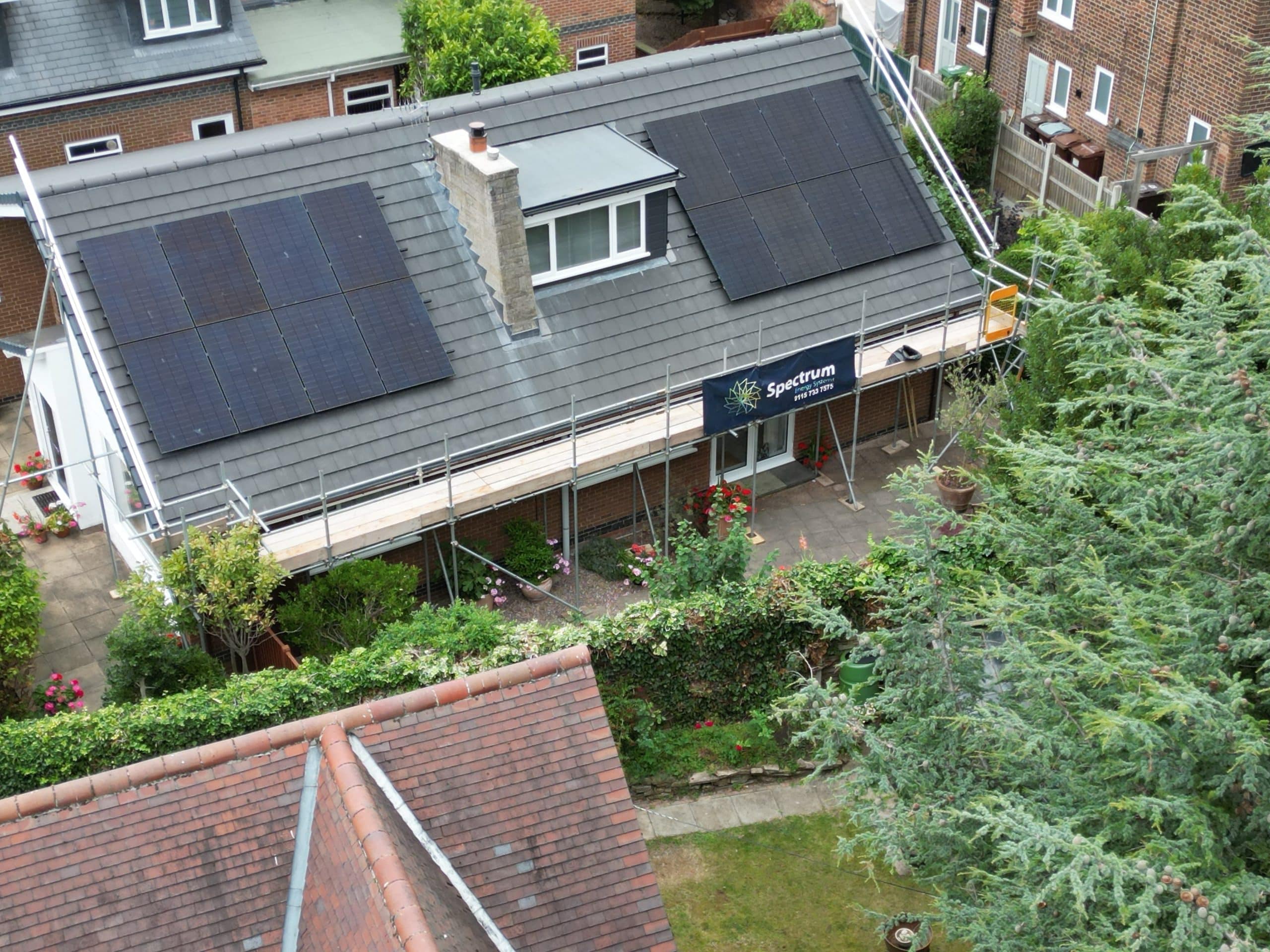 7.2kW JA Solar all-black panel array in two strings on pitched tile roof during installation at Sherwood property