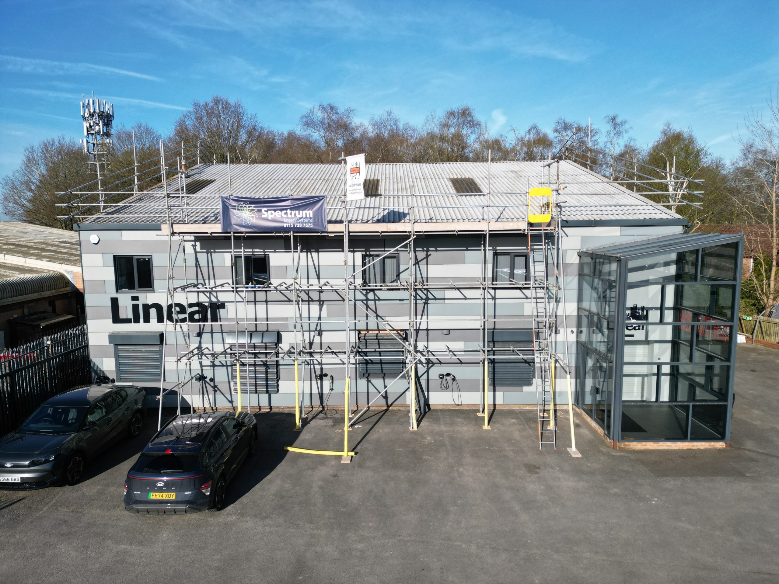 Scaffolding setup for commercial solar panel installation at Linear Insulation premises on Lockwood Close, Nottingham