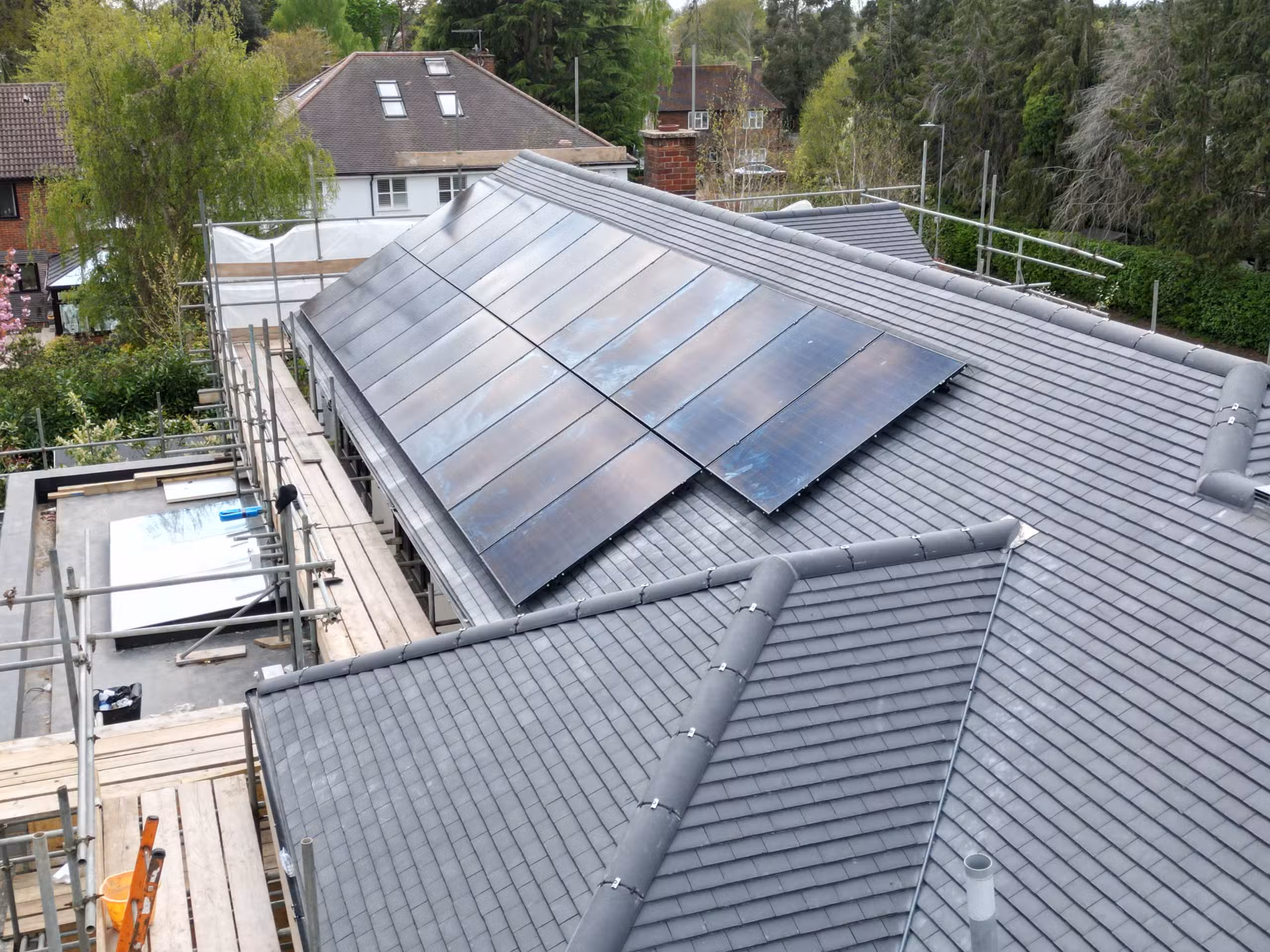 Professional solar installer reviewing system design with homeowner before installation