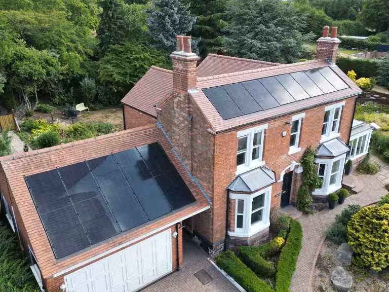 GSE In Roof Solar Panel Arrays Main House And Garage Roof Drone Overview Michelle Mean