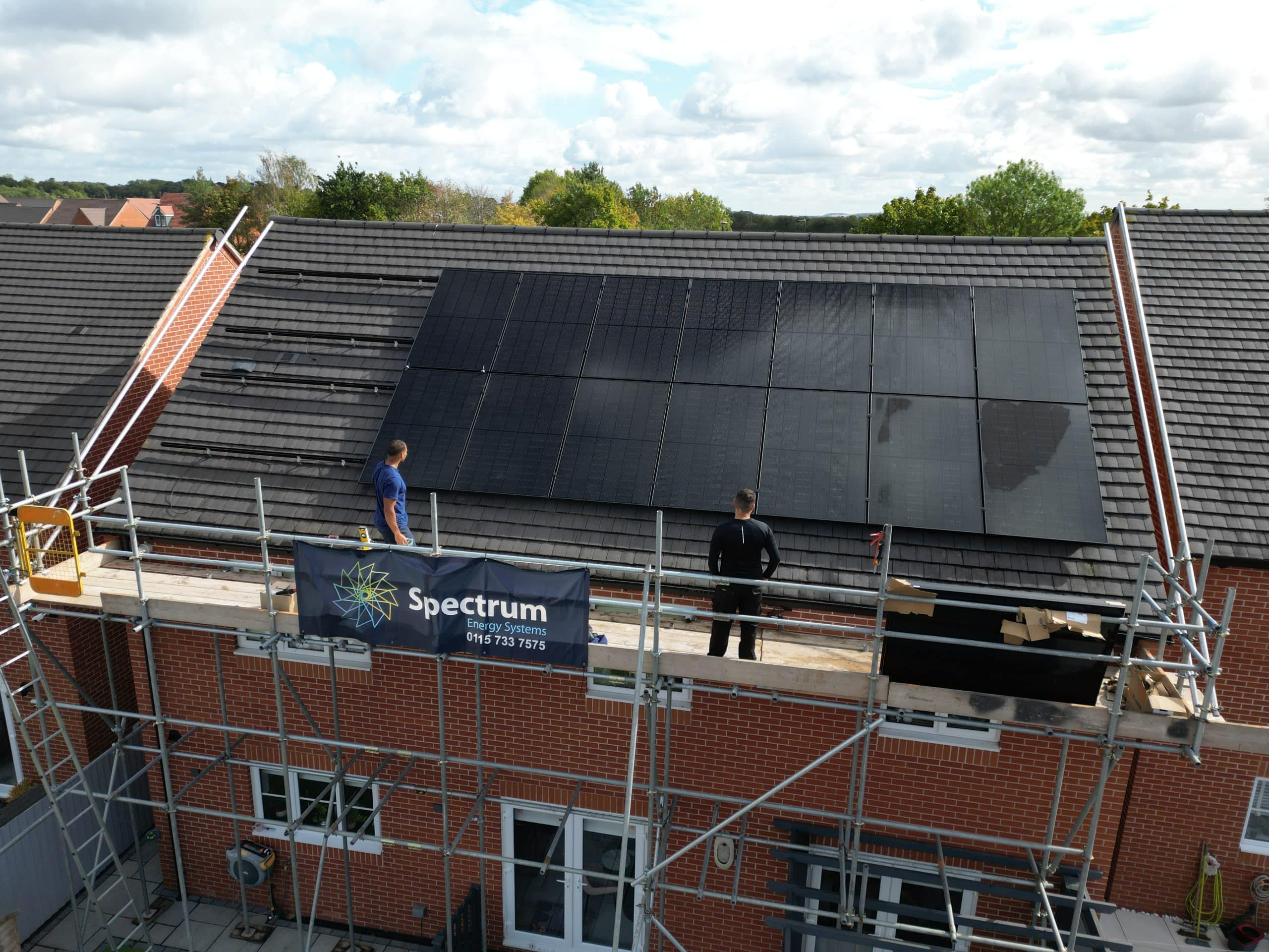 Commercial solar PV panels installed on warehouse roof UK