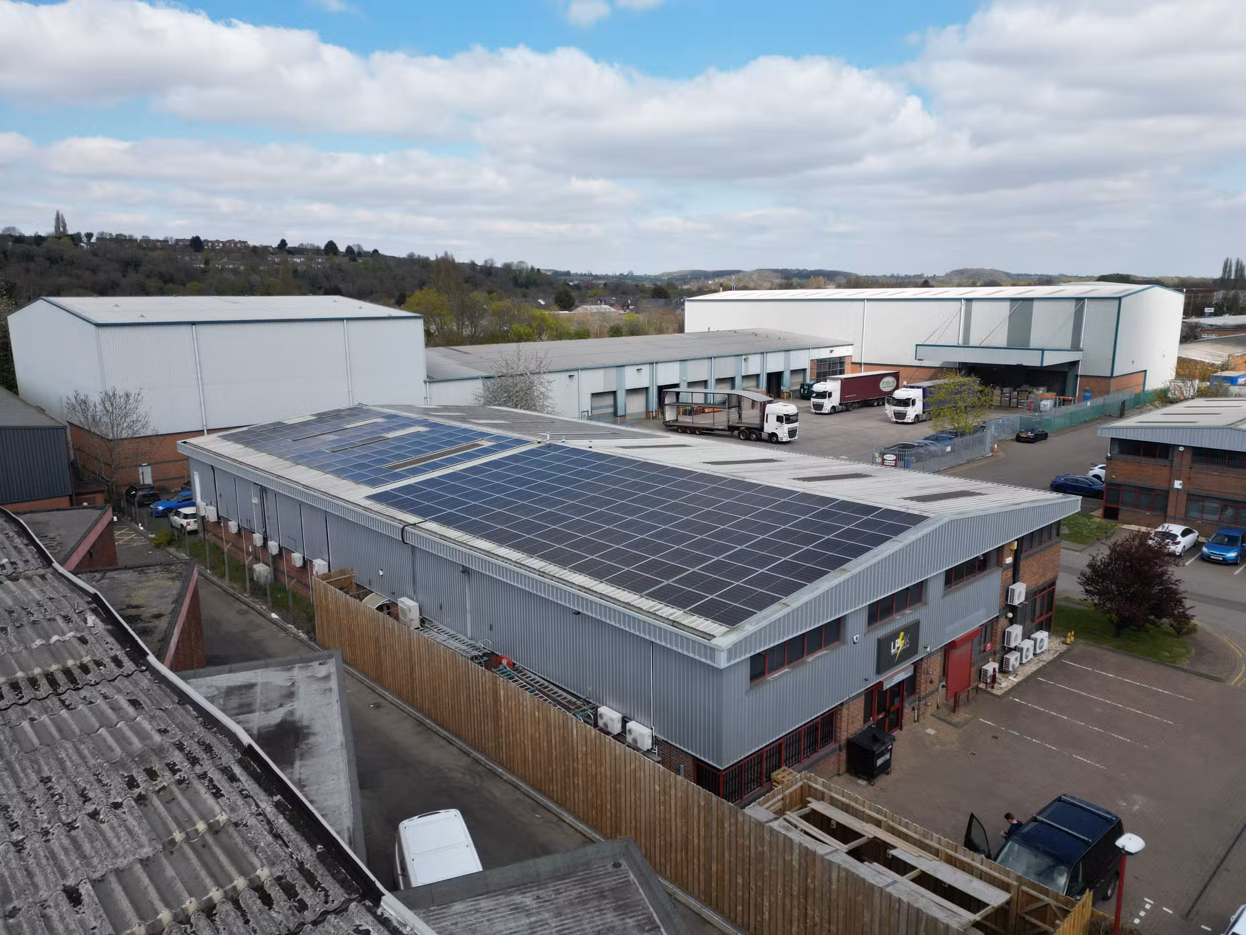 Solar panel kWh output calculation showing roof-mounted PV panels in UK conditions