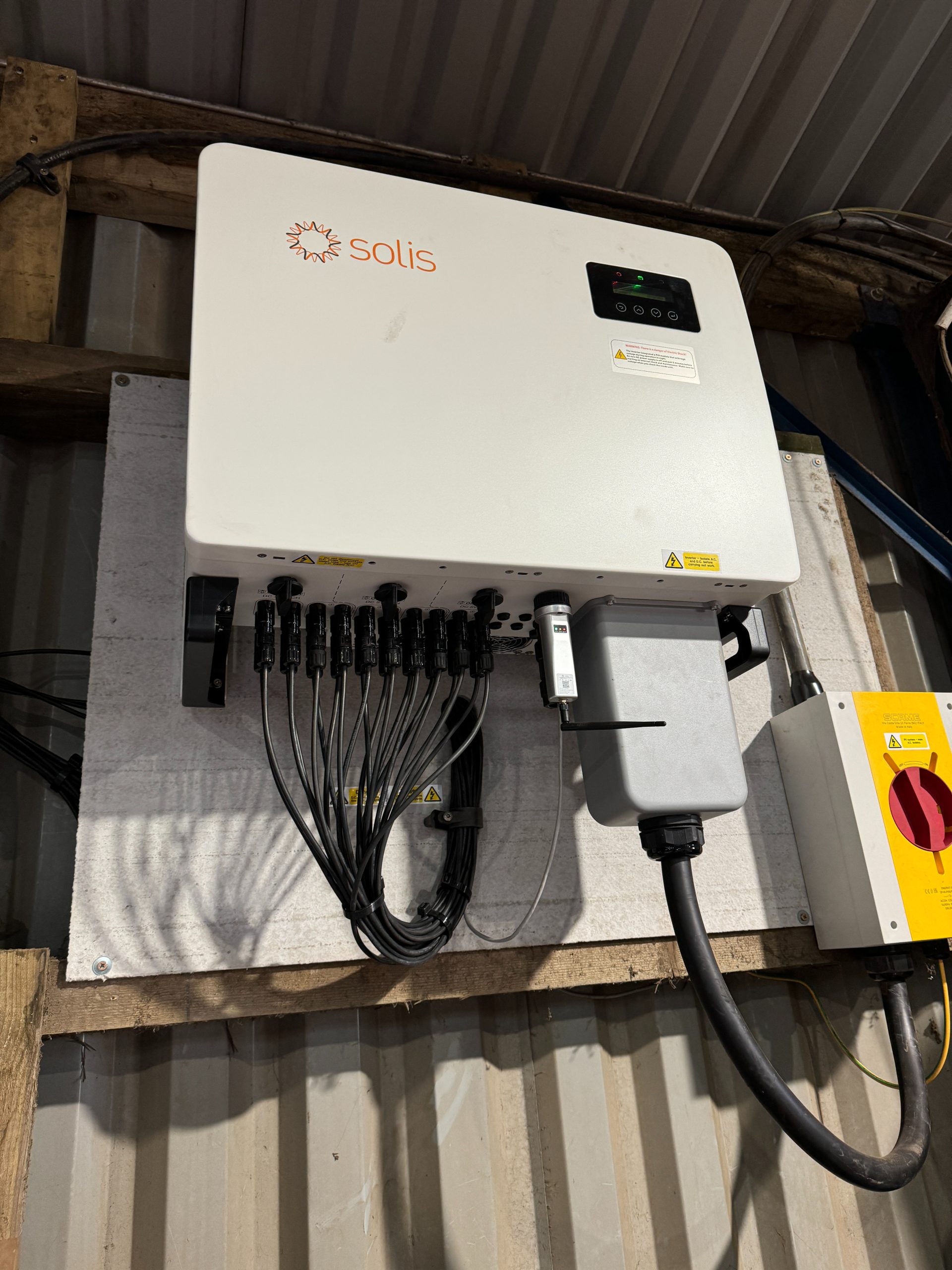 Wall-mounted Solis 50kW 3-phase string inverter at Jacksons Nurseries plant machinery building