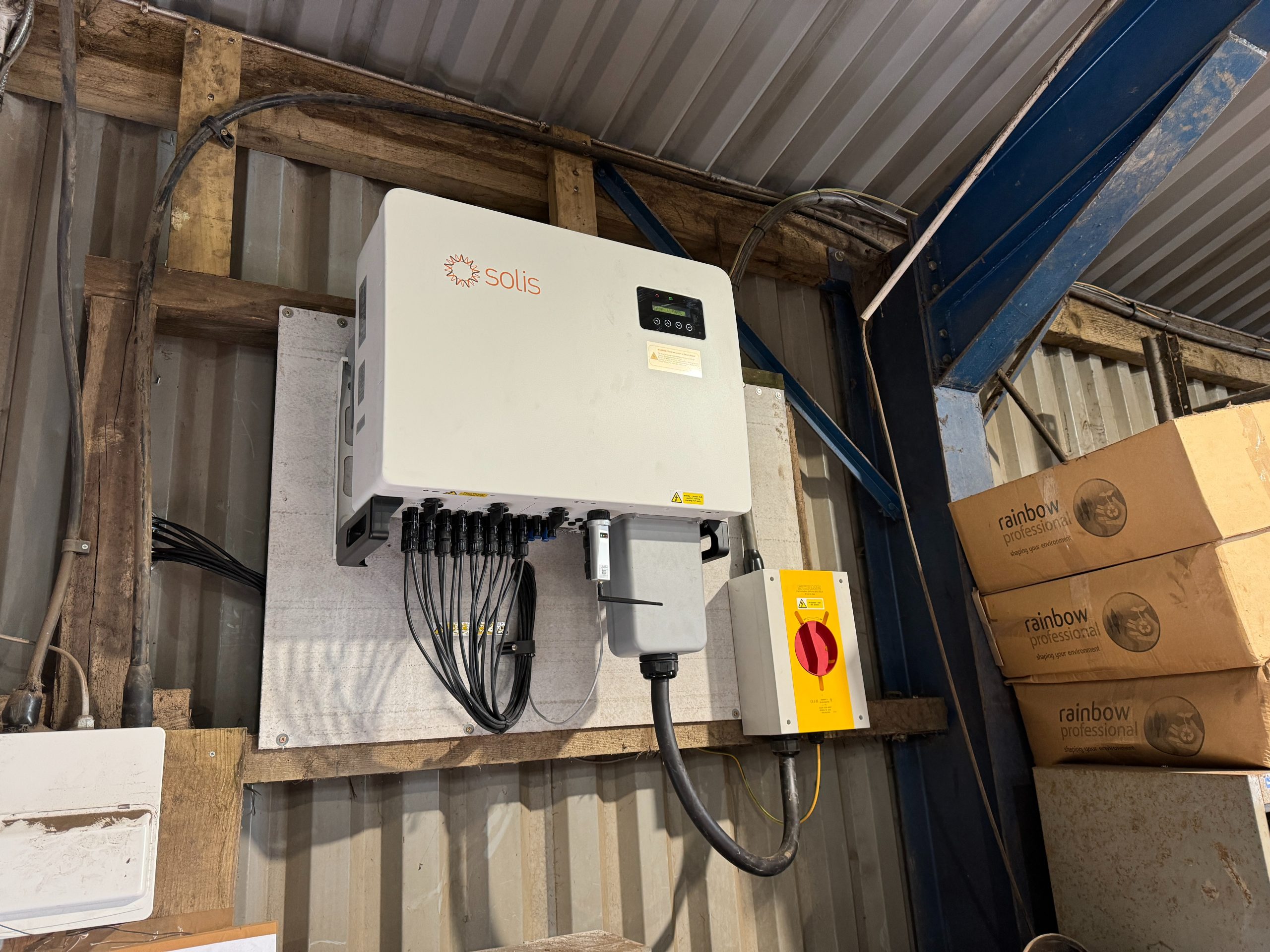 Solis 50kW 3-phase string inverter with AC and DC isolators installed at Jacksons Nurseries plant machinery building