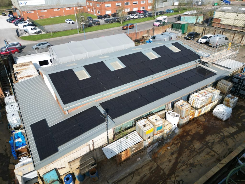 24kW commercial solar panel installation on workshop metal roof at Keyte Smith, Kirkby-in-Ashfield - aerial view of the completed 48-panel array