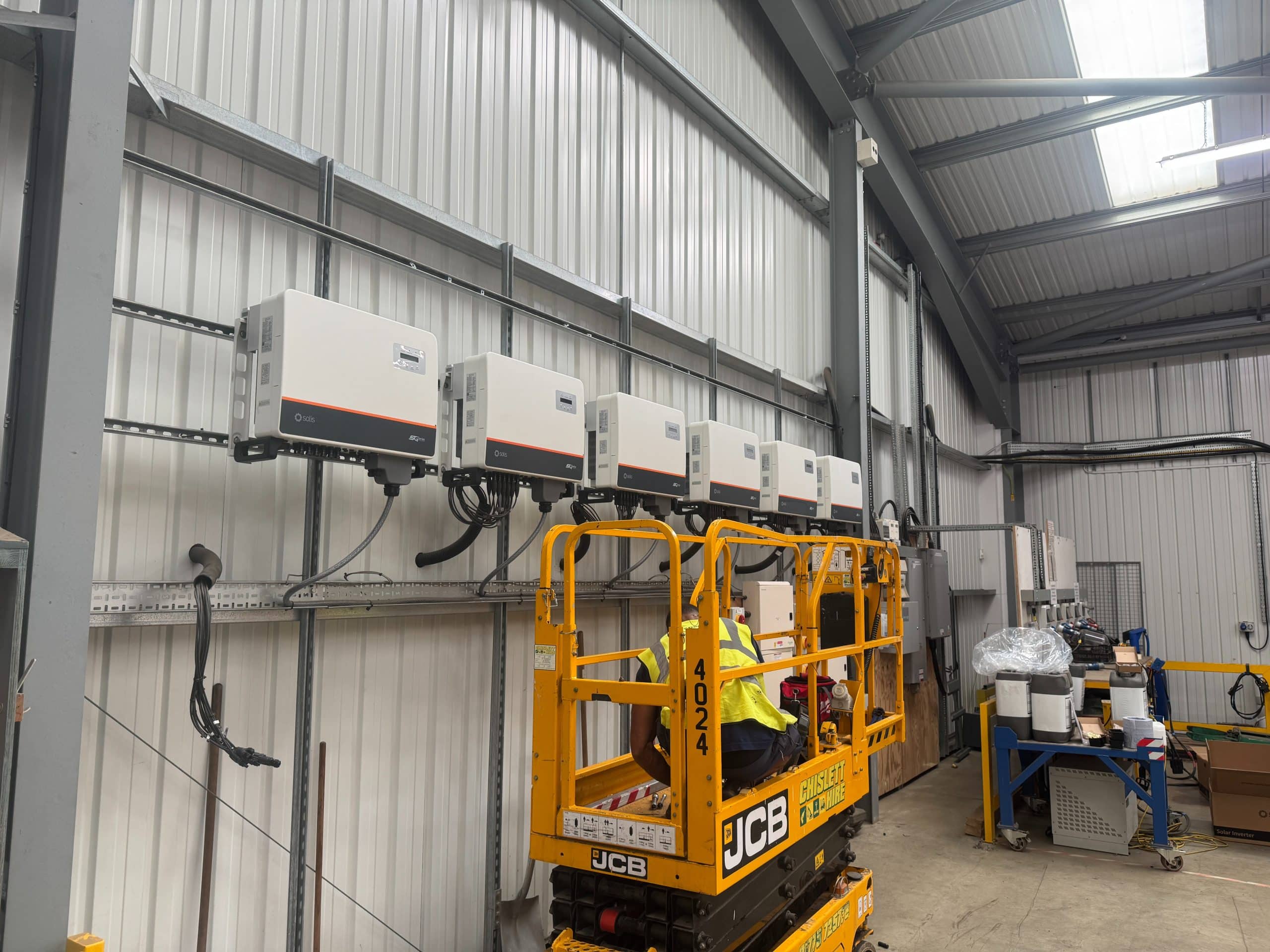 Commercial solar battery storage pairs with Solis three-phase inverters: six 25kW units wall-mounted at Elsoms Seeds (Spectrum Energy Systems installation)
