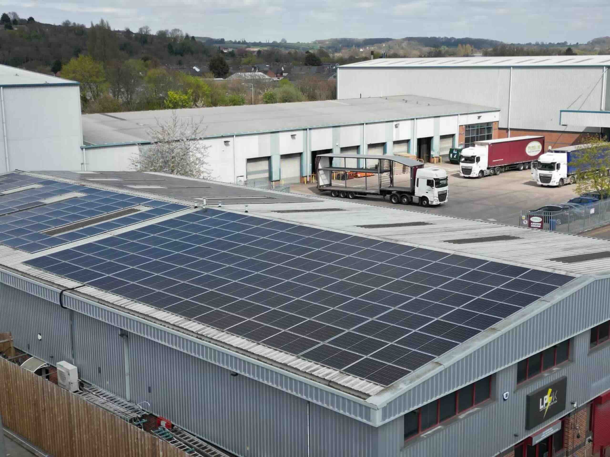 Rooftop solar panels on a commercial warehouse, commercial solar installers serving Chellaston